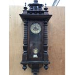 A VICTORIAN MAHOGANY EIGHT DAY SPRING DRIVEN WALL CLOCK