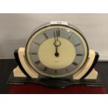 A VINTAGE BLACK AND CREAM 'SMITHS' MANTEL CLOCK