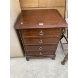 A STAG MINSTREL MAHOGANY BEDSIDE CHEST OF FOUR DRAWERS