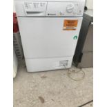 A WHITE 7KG HOTPOINT TUMBLE DRYER BELIEVED IN WORKING ORDER BUT NO WARRANTY
