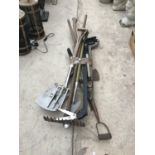 A COLLECTION OF GARDEN TOOLS TO INCLUDE STAINLESS STEEL SPADE AND FORK, RAKE ETC.