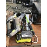 A GTECH HAND HELD HOOVER BELIEVED IN WORKING ORDER BUT NO WARRANTY AND RYOBI BATTERY WITH CHARGER