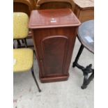 A VICTORIANMAHGOANY ARCHED DOOR POT CUPBOARD