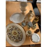 A GROUP OF ASSORTED CHINA AND STONEWARE TO INCLUDE THREE VINTAGE BOTTLES AND A WEDGWOOD URN SHAPED