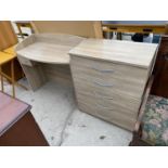 AN OAK EFFECT DRESSING TABLE AND CHEST OF FIVE DRAWERS