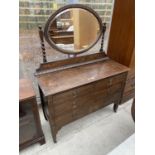 AN EARLY 20TH CENTURY OAK DRESSING TABLE, 45" WIDE