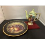 A HAND PAINTED PLATE AND A TEAPOT BOTH WITH FRUIT BOWL DESIGN