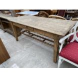 A VICTORIAN STRIPPED PINE FARMHOUSE TABLE ON TAPERED LEGS, COMPLETE WITH SINGLE SIDE DRAWER, 72x30"