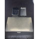 A WHITE METAL CIGARETTE CASE AND TWO LIGHTERS