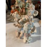 AN ASSORTMENT OF CERAMIC VICTORIAN FIGURES