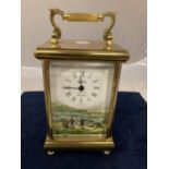 A SPODE MODERN BRASS CASED CARRIAGE CLOCK THE FACE DEPICTING A 19TH CENTURY PICNIC SCENE