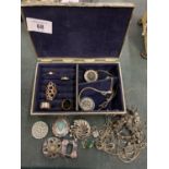 A WHITE METAL BOX CONTAINING VARIOUS COSTUME JEWELLERY TO INCLUDE FIVE RINGS ETC