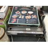 AN ELECTRIC GRIDDLE AND A MICROWAVE TIME SAVING COLLECTION