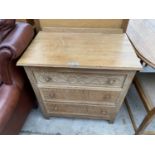 A SMALL OAK CHEST OF THREE DRAWERS