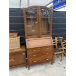 A MID 20TH CENTURY MAHOGANY BUREAU BOOKCASE WITH GLAZED AND LEADED DOORS, 36" WIDE