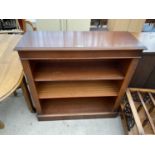 A MAHOGANY THREE TIER BOOKCASE