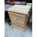 A MODERN PINE TWO DRAWER FILING CABINET