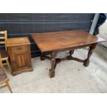 AN 18TH CENTURY STYLE OAK REFECTORY DINING TABLE ON TURNED LEGS AND SHAPED STRETCHERS, 60x33"