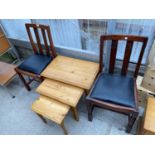 A NEST OF THREE PINE TABLES AND A PAIR OF DINING CHAIRS