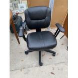 A MODERN SWIVEL OFFICE CHAIR