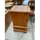 A SMALL YEW WOOD CABINET WITH ONE DOOR AND ONE DRAWER