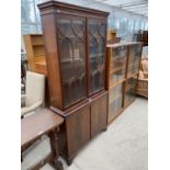 A MAHOGANY BOOKCASE CABINET WITH TWO LOWER DOORS AND TWO UPPER GLAZED PANEL DOORS