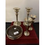 A PAIR OF BELIEVED SILVER CANDLESTICKS, A PAIR OF BELIEVED SILVER POSIE VASES AND A SILVER PLATE