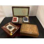 THREE WOODEN CARD BOXES WITH FOUR DECKS OF CARDS
