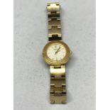 A SEIKO LADIES YELLOW METAL WRIST WATCH IN WORKING ORDER