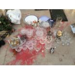 AN ASSORTMENT OF GLASS WARE TO INCLUDE CHAMPAGNE FLUTES AND WINE GLASSES ETC