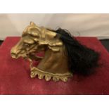 A LATE 19TH CENTURY/EARLY 20TH CENTURY PAINTED BRONZE ORNAMENT IN THE FORM OF A HORSES HEAD WITH