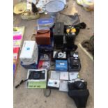 AN ASSORTMENT OF CAMERA EQUIPMENT TO INCLUDE VARIOUS OLYMPUS CAMERAS ETC