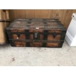 A VINTAGE WOODEN CHEST