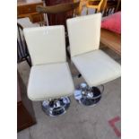 TWO LEATHERETTE HIGH CHAIRS ON CHROME SUPPORTS