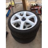 A PAIR OF RADIAL TYRES AND RIMS