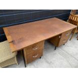 A 1960s TWIN PEDESTAL DESK