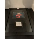 A FRAMED PICTURE OF WAYNE ROONEY AND HIS AUTOGRAPH COMPLETE WITH CERTIFICATE OF AUTHENTICITY
