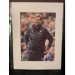 A SIGNED AND MOUNTED PHOTOGRAPH OF JURGEN KLOPP COMPLETE WITH CERTIFICATE OF AUTHENTICITY