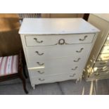 A FRENCH STYLE CREAM CHEST OF FIVE DRAWERS