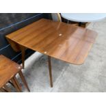 A G-PLAN E-GOMME TEAK DROP-LEAF DINING TABLE, 54x33" FULLY OPEN