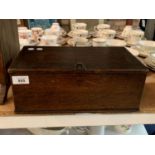 A VINTAGE WOODEN STORAGE BOX WITH CLASP TO RECEIVE A PADLOCK