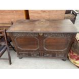 A GEORGE III OAK BLANKET CHEST, WITH TWO DRAWERS TO THE BASE, CARVINGS AND INLAID DECORATION