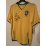 A BRAZIL SHIRT SIGNED BY ROBINHO COMPLETE WITH CERTIFICATE OF AUTHENTICITY