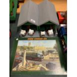 A HANDMADE WOODEN TRANSPORT DEPOT WITH FOUR DIE CAST EDDIE STOBART LORRIES