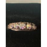 A BOXED SILVER RING MARKED 925 WITH FIVE IN LINE COLOURED STONES
