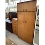 A SCHREIBER TEAK CHEST OF FIVE DRAWERS AND WARDROBE