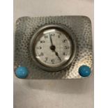 AN ARTS AND CRAFTS STYLE PEWTER MANTEL CLOCK
