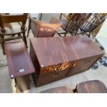 AN INLAID MAHOGANY MAGAZINE RACK TABLE AND A MAHOGANY EFFECT CABINET WITH ONE DOOR AND TWO DRAWERS