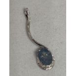 A 9 CARAT WHITE GOLD PENDANT WITH A PALE BLUE STONE AND CLEAR STONE CHIPS