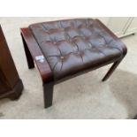 A MAHOGANY AND LEATHER FOOTSTOOL